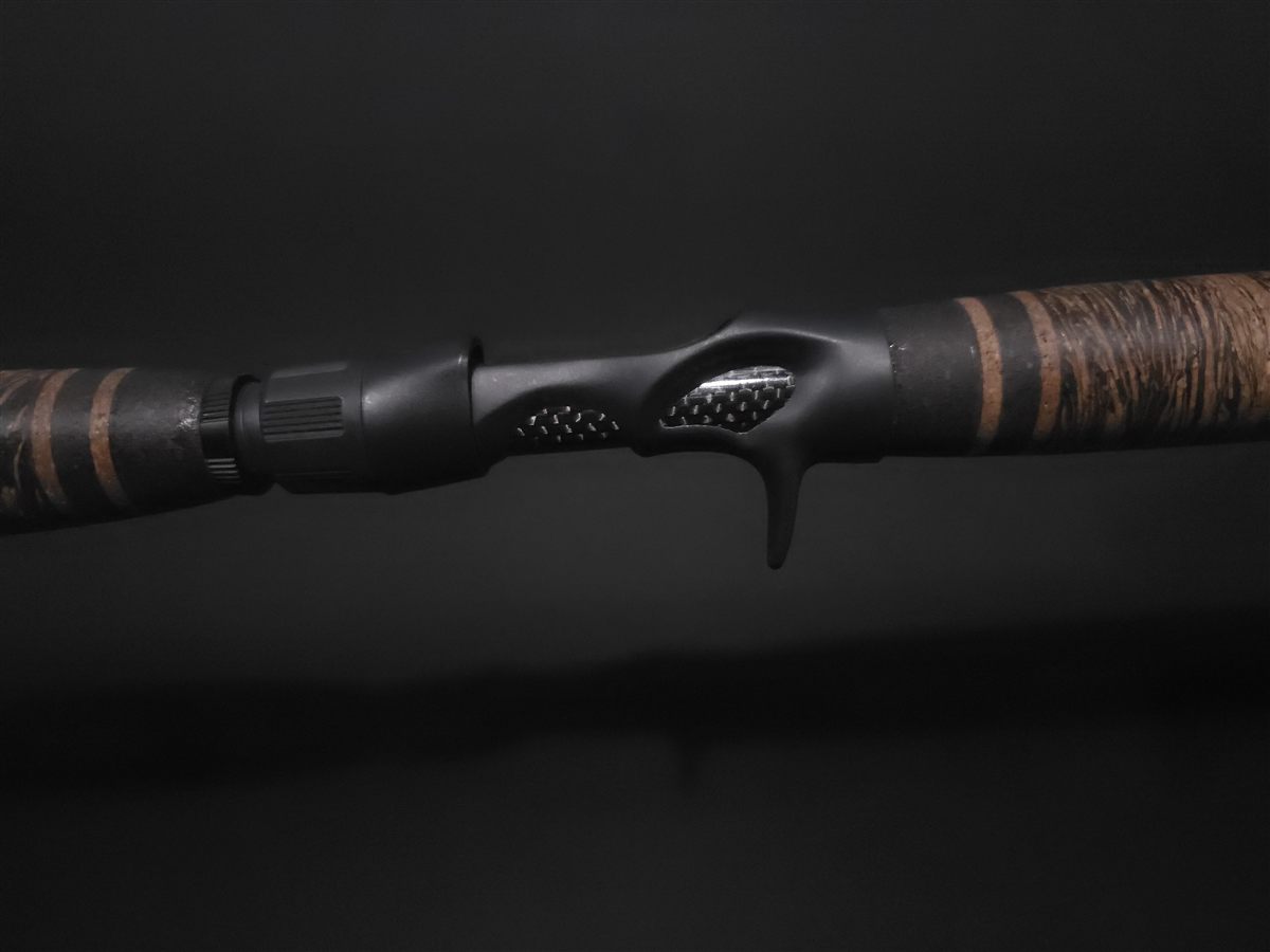 Black casting reel seat and textured rod grip