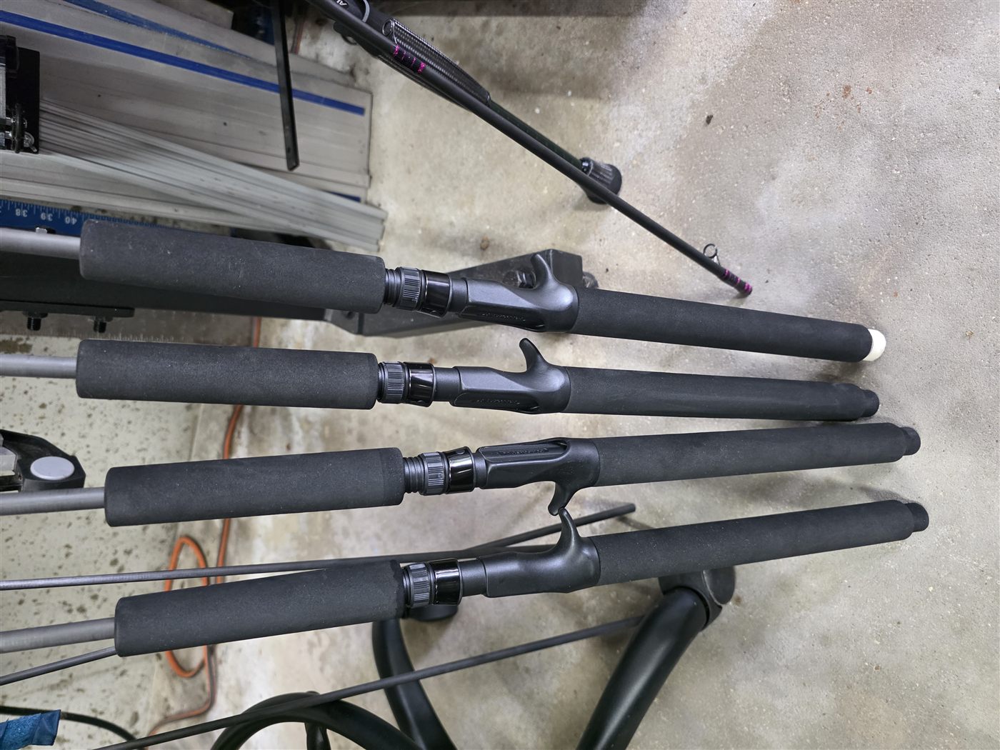 Four black EVA Perfect Plugger handle assemblies in progress